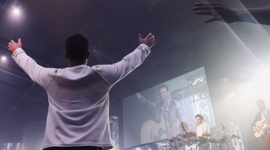 man worshipping with his whole heart